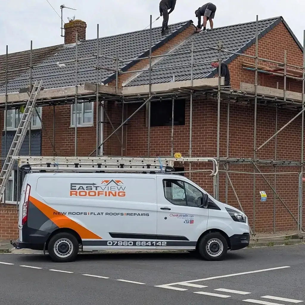 East View Roofing van outside a house during a new pitched roof installation